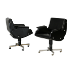 Paire de fauteuils pivotants, simili - cuir et acier, italie, circa 1960.
