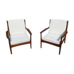 Paire de fauteuils scandinave en teck Paire de fauteuils scandinave en teck