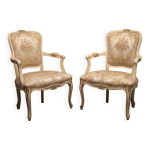 Paire de fauteuils de style louis xv bois sculpté, doré et tissu brocart Paire de fauteuils de style louis xv bois sculpté, doré et tissu brocart