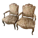 Paire de fauteuils style louis xv dorés et tapisserie fleurs Paire de fauteuils style louis xv dorés et tapisserie fleurs