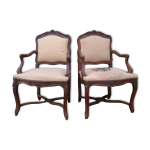 Paire de fauteuils de style louis xv en noyer