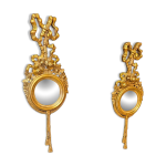 Paire de miroirs ronds en bois doré de style louis xvi Paire de miroirs ronds en bois doré de style louis xvi