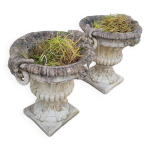 Paire de vases jardinires dcores de visages en pierre reconstitue 1950s
