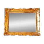 Petit miroir en bois dor.
