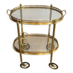 Petite table roulante ovale en laiton  double plateaux amovibles de la maison bagus