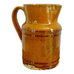 Pichet ancien en faence franaise  glaure orange