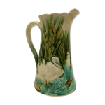Pichet ancien en faence polychrome dcors de cygnes xx sicle