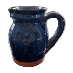 Pichet signé ancien en terre cuite vernissée bleue Pichet signé ancien en terre cuite vernissée bleue
