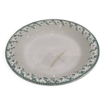 Plat creux ancien en porcelaine opaque de gien terre de fer d�cor vert