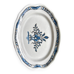 Plat ovale, cul noir en terre cuite bleue