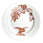 Plat rond longwy en terre de fer blanche et marron