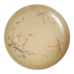 Plat rond vintage en porcelaine par la maison revol, france