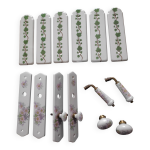 Poignes et plaques de propret en porcelaine