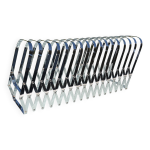 Porte - revues en mtal extensible