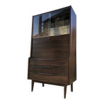 Secrétaire vintage scandinaves en palissandre avec ses tiroirs aux poignées ailerons. Secrétaire vintage scandinaves en palissandre avec ses tiroirs aux poignées ailerons.