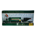 Semi - remorque ''freightliner'' + plateau supportant 1 sapin