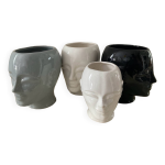 Srie de 4 vases vintage tte en cramique annes 70 - 80