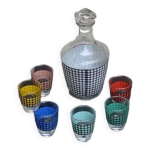 Service a liqueur composé d'une carafe et 6 petits verres a liqueur, motif pieds de poule Service a liqueur composé d'une carafe et 6 petits verres a liqueur, motif pieds de poule
