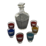 Service a liqueur composé d'une carafe et 6 petits verres a liqueur, motif pieds de poule vintage Service a liqueur composé d'une carafe et 6 petits verres a liqueur, motif pieds de poule vintage