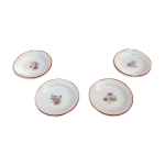 Suite de 4 assiettes anciennes de dinette porcelaine décor foral Suite de 4 assiettes anciennes de dinette porcelaine décor foral