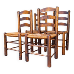 Suite de 4 chaises brutalistes paillées de george robert Suite de 4 chaises brutalistes paillées de george robert