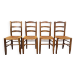 Suite de 4 chaises brutalistes vintage en bois et paille des années 60 Suite de 4 chaises brutalistes vintage en bois et paille des années 60