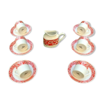 Suite de 6 tasses  caf et pot  lait, porcelaine fine blanche avec frise  dcor floral