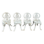 Suite de quatre chaises de jardin en fonte de style victorien vers 190 Suite de quatre chaises de jardin en fonte de style victorien vers 190