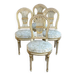 Suite de quatre chaises montgolfires de style louis xvi - bois laqu et dor