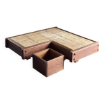 Table basse brutaliste avec pot de fleurs