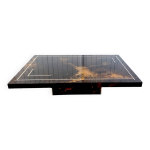 Table basse laquée à décor solaire Table basse laquée à décor solaire