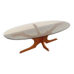 Table basse ovale vintage hugues poignant en teck et verre fum�