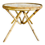 Table basse ronde en bambou et rotin, plateau verre circa 1960s Table basse ronde en bambou et rotin, plateau verre circa 1960s
