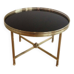 Table basse ronde en laiton et plateau de verre laqué noir de la maison jansen Table basse ronde en laiton et plateau de verre laqué noir de la maison jansen