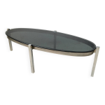 Table basse seventies ovale chrome et verre fum�
