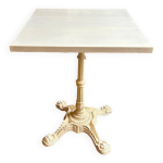 Table bistrot en fonte de fer beige et bois écru Table bistrot en fonte de fer beige et bois écru