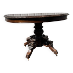 Table de chasse ovale en chêne sculpté style xix e aux dragons Table de chasse ovale en chêne sculpté style xix e aux dragons