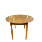 Table de cuisine ronde à volets extensible en bois Table de cuisine ronde à volets extensible en bois