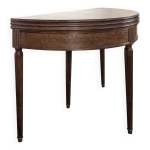 Table demi - lune ou table de jeu en acajou moucheté Table demi - lune ou table de jeu en acajou moucheté