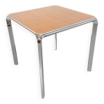 Table à manger carrée pierre paulin vintage en bois de palissandre et métal Table à manger carrée pierre paulin vintage en bois de palissandre et métal