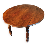 Table  manger ovale  abattants en noyer franais, dbut 1900, extensible sur roulettes