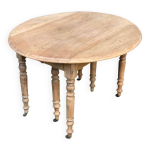 Table à manger ronde extensible à volets rénovée en bois massif Table à manger ronde extensible à volets rénovée en bois massif