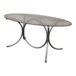 Table ovale vintage design en verre fumé et piètements chromé Table ovale vintage design en verre fumé et piètements chromé