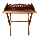Table pliante sculpte orne de style victorien, annes 1920