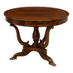 Table ronde empire acajou avec incrustations et pieds griffes