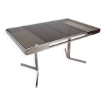 Table de salle  manger  rallonges extensibles par roche et bobois