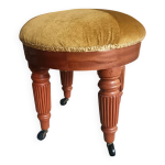 Tabouret tapiss sur roulettes