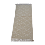 Tapis beige et blanc fait main en pure laine 65x144cm Tapis beige et blanc fait main en pure laine 65x144cm