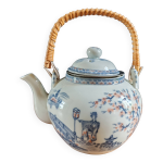 Théière japonaise en porcelaine et anse en bambou Théière japonaise en porcelaine et anse en bambou