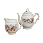 Théière et son pot à lait vintage porcelaine Théière et son pot à lait vintage porcelaine